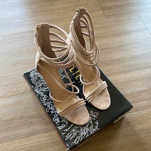 Nude strappy high heels